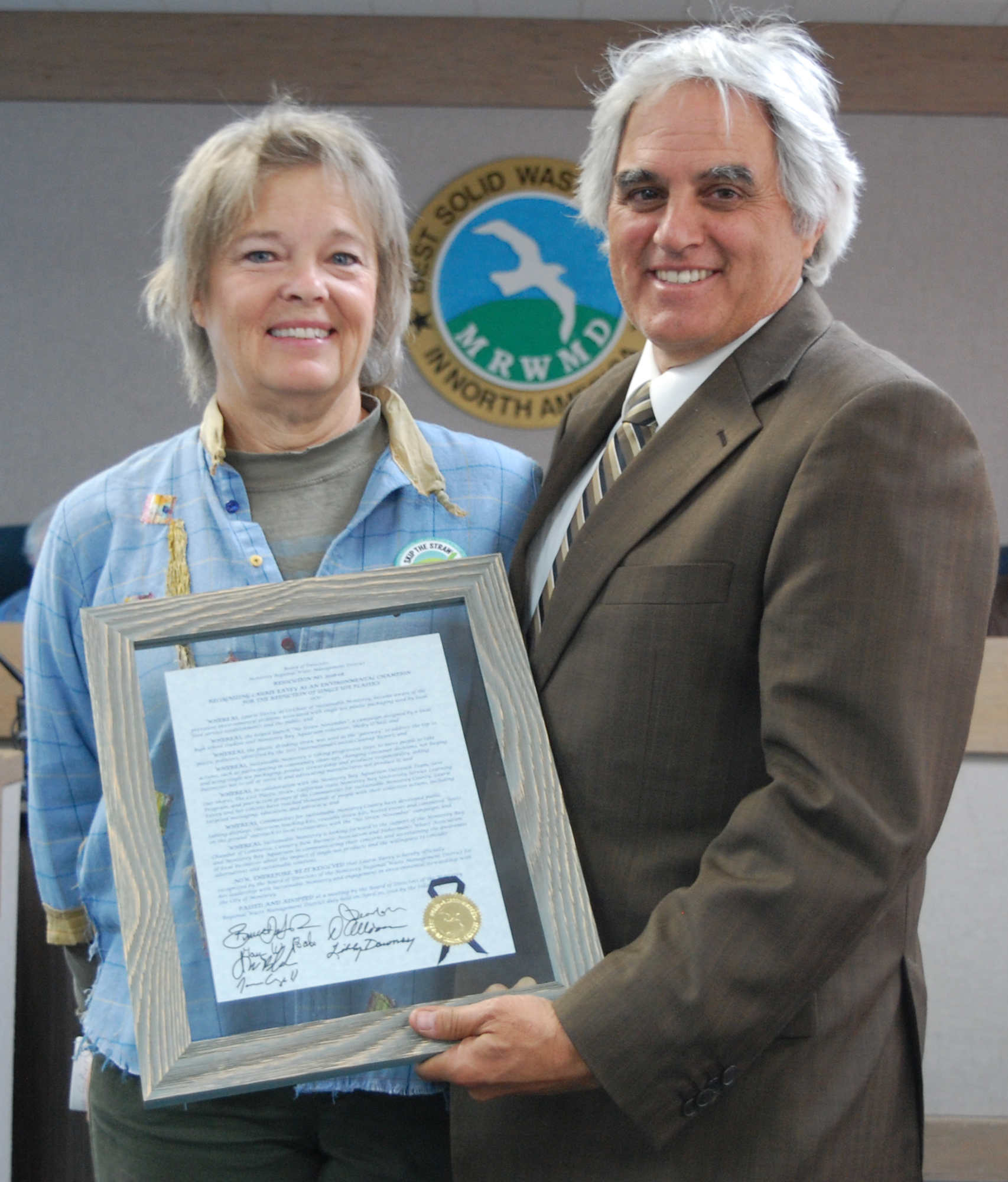 Laurie Eavey receives the Skip the Straw Award from Bruce Delgago, Marina Mayor and MRWMD Board Director